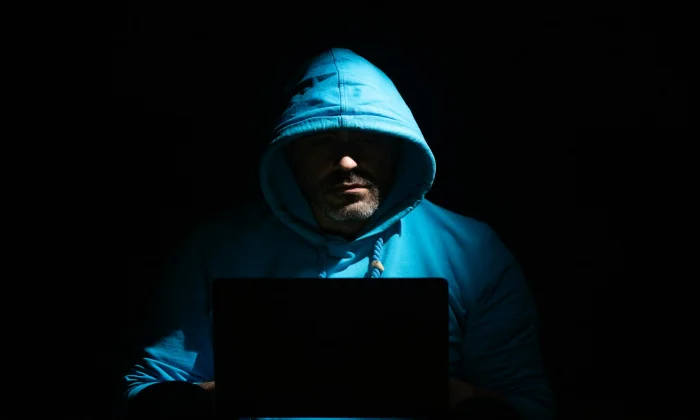Content creator reviewing a privacy and search removal request on a laptop, representing the right to be forgotten